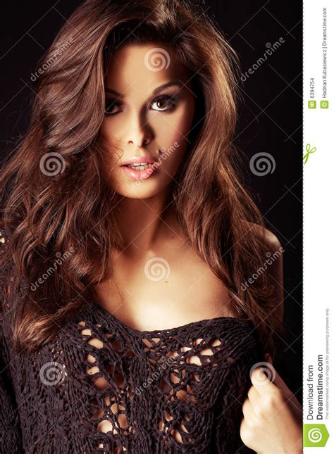 Beautiful And Sexy Brunette Girl On Dark Stock Images