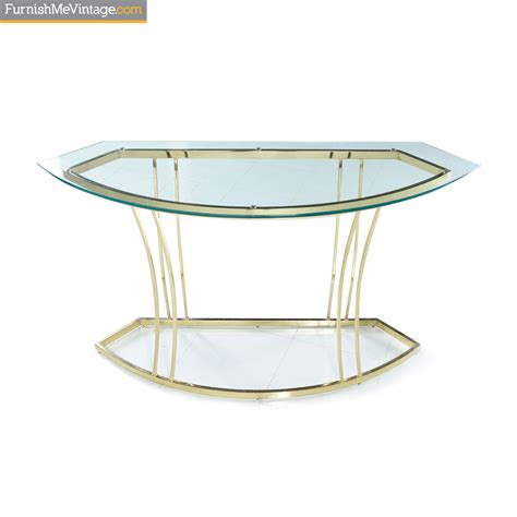 This vintage folding console table is from paris, france and was made from oak veneer and brass legs, circa 20th century. Brass Console Table with Glass Top - 1970s Hollywood Regency