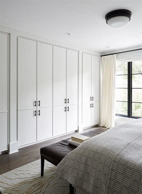 Floor to ceiling dealer directory. Wall of Floor to Ceiling Closet Cabinets - Modern - Bedroom