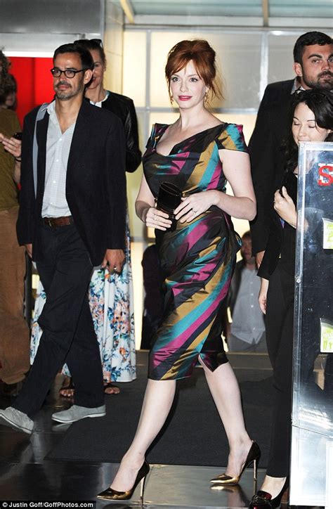 Christina Hendricks Stands Out In Striped Asymmetric Dress At Gods Pocket Photocall Daily