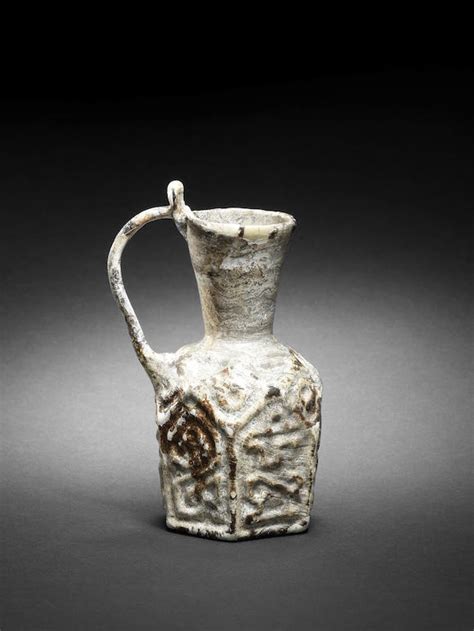 bonhams a mould blown inscribed glass jug persia 12th century
