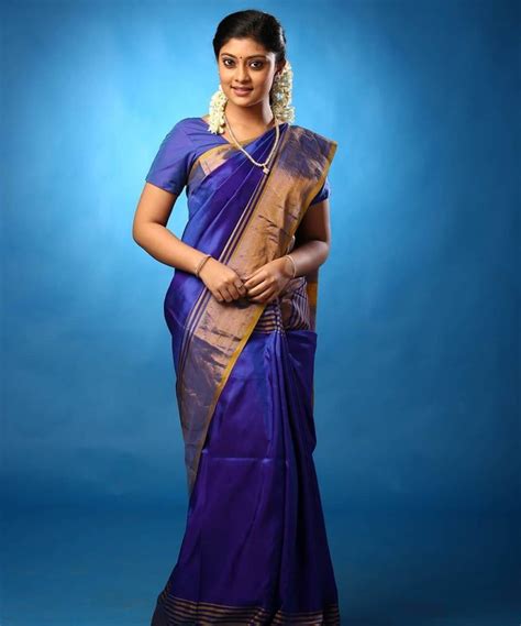ammu abhirami easy and simple saree look in blue silk saree with gajra hair style k4 fashion