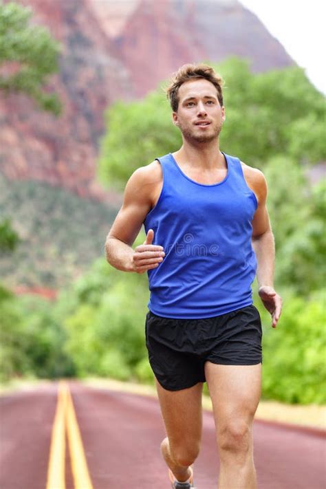 Sport And Fitness Runner Man Running On Road Stock Photo Image Of