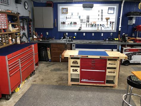 My space in my 2 car garage. The smaller work bench is a modified