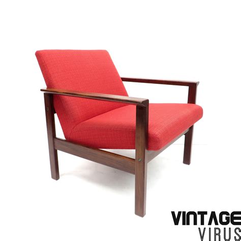 Set of 4 daw red mid century modern plastic dining armchair, wood eiffel legs by cozyblock (4) $340. Vintage red armchair from Pastoe with wooden frame made in ...