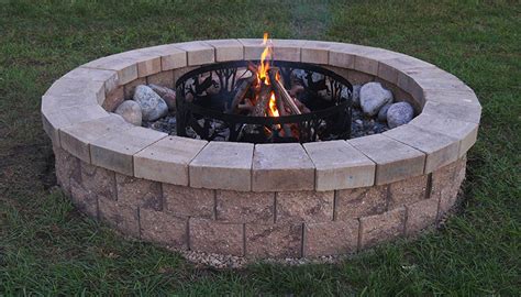 The fire pit is laid out to be centered to the existing pear tree and the window of the house. The Allan Block Blog: October 2015