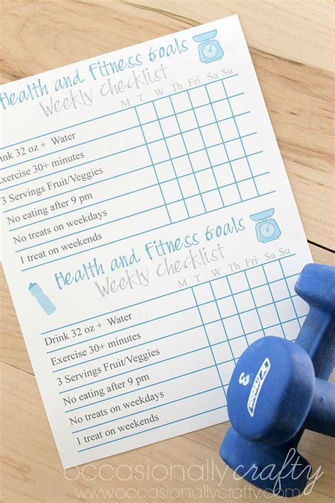 A Printable Health And Fitness Checklist With Dumbbells On A Wooden Table
