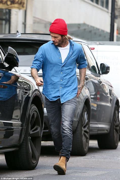 David Beckham Puts On Suave Appearance At Victorias Store Daily Mail