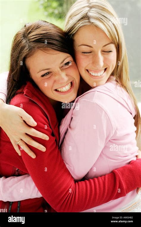 Two Girls Hugging Stock Photo Alamy