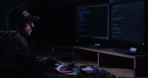 Hacker Sitting In Dark Room In Front Of Stock Footage Sbv 309840247