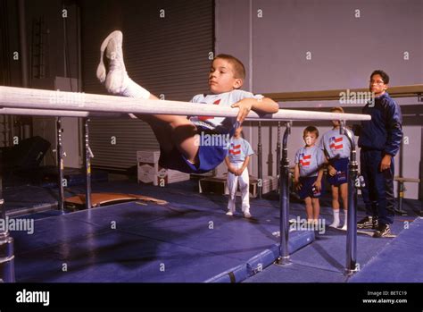Boy Teen Male Gymnasts Perform Show Demonstrate Skill Training