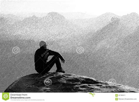 Moment Of Loneliness Man In Shirt Sit On The Cliff Of Rock And