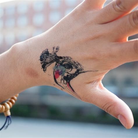 35 Exquisite Hand Tattoo Designs