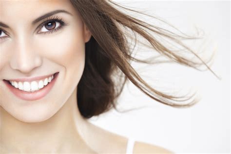 Beauty Portrait Of A Young Brunette Woman With Beautiful Smile Luís