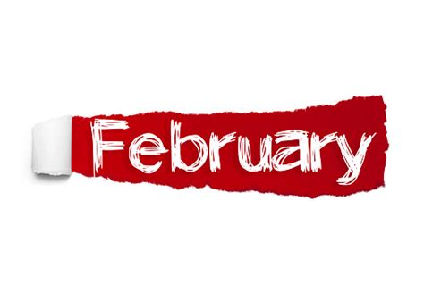 The Word February Appearing Behind Red Torn Paper Stock Photo