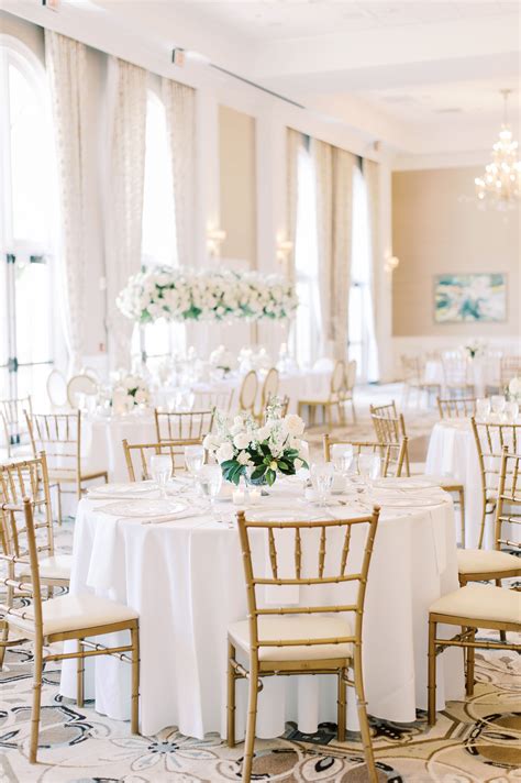 Ballroom Wedding Reception Featured All White Flowers With A Mixture Of