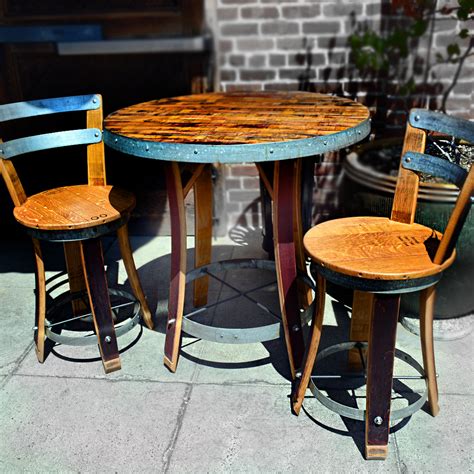Round table tops with pedestal bases easily fit on balconies and patios for alfresco dining, afternoon coffee and drinks with a friend. Wine Barrel Bistro Table with Two Chairs - Napa General Store
