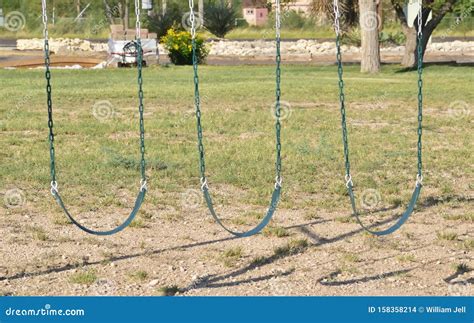 Empty Swing Set Swings Waiting For Children To Play Stock Photo Image