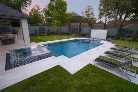 Get The Ultimate Backyard Retreat With A Rectangle Pool With Jacuzzi