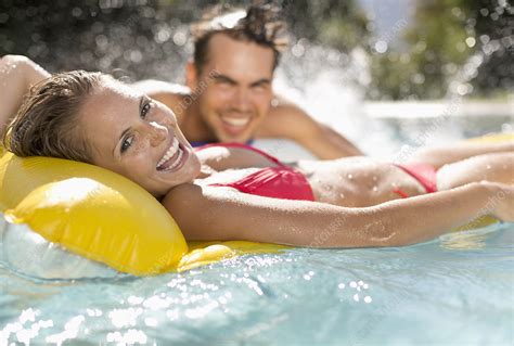 Couple Relaxing In Swimming Pool Stock Image F0139582 Science Photo Library