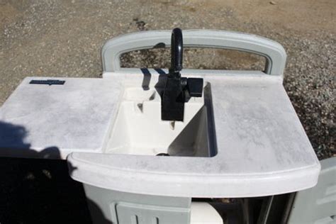 Kraus kbu11 undermount single bowl 16 gauge stainless steel if you are using the sink for garden and yard use, it can be easier to supply water to it with a portable unit that uses a hose connection for drainage and. Lot Detail - POTTING CABINET WITH HOSE REEL AND MINI SINK