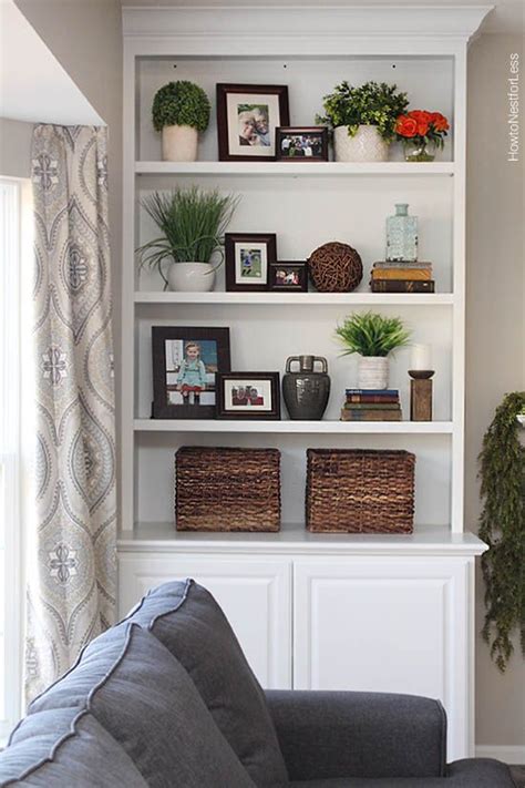 Once you've decided how to arrange your books, it's time to accessorize. 5 Simple Tips For Decorating Shelves - Organised Pretty Home
