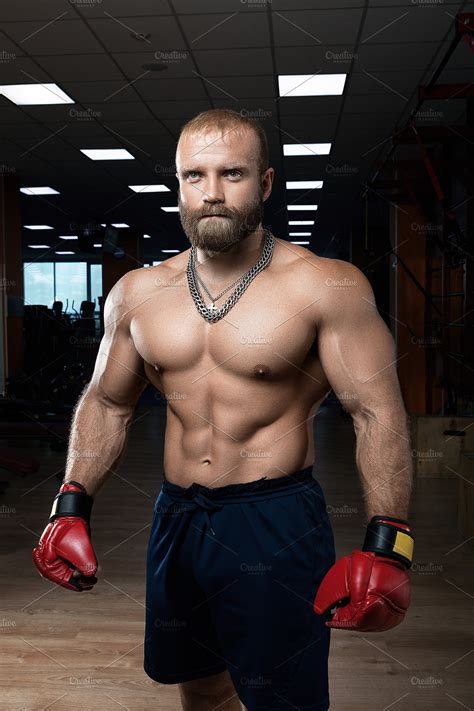 Strong Muscular Man Boxing At The Gym High Quality Sports Stock