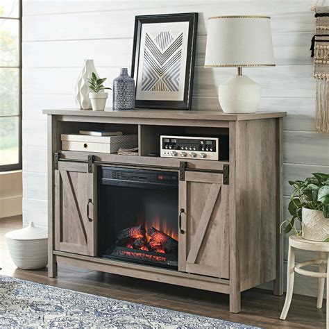 Timelessly styled, with a nod to modern farmhouse design, the marlowe media cabinet displays your favorite items or electric components behind glass. Best Electric Fireplace TV Media Consoles | Fireplace ...