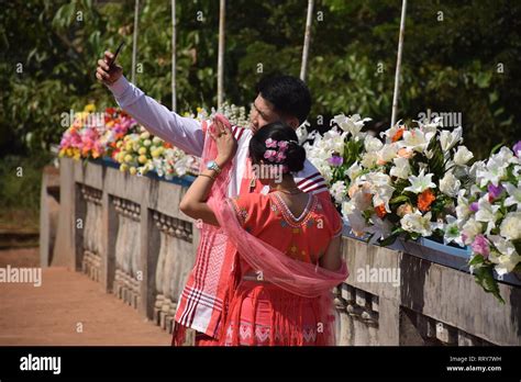 Burmese Couple Taking Selfie On A Bridge Nearby Kyauk Ka Lat Pagoda In Hpa An Myanmar Stock