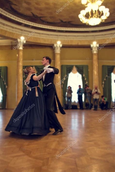 Young Couple Dancing The Waltz In The Ballroom Stock Photo By ©naskasu