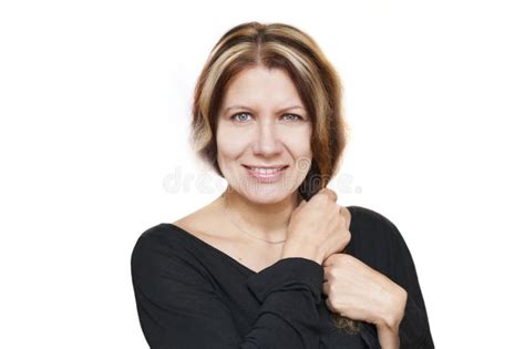 Portrait Of A Beautiful Middle Aged Woman On A White Background A Woman Smiles With A Beautiful