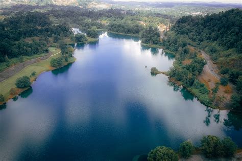 Aerial View Photography Of Lake Near Trees · Free Stock Photo