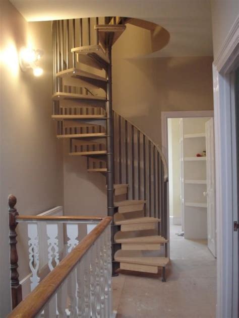 Scandinavian Spiral Staircase With Wooden Handrails By British Spirals