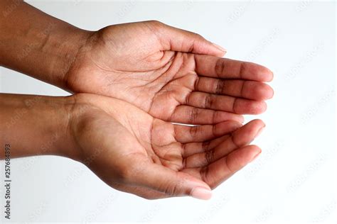 Black African Hands Out Reaching Begging Showing With Palms Up Stock