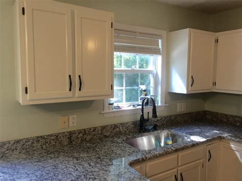 Please consider the era of your home when you are designing your kitchen!! Sherwin Williams Creamy - 2 Cabinet Girls