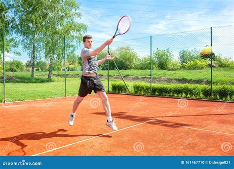 Young Sports Man Holding A Tennis Racket Stock Photo Image Of Athlete