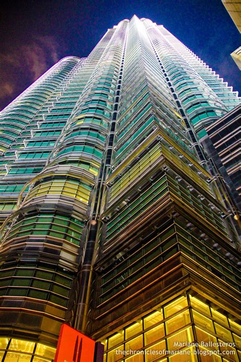 The petronas towers by architect cesar pelli was built in kuala lumpur, malaysia in 1998. Day to Night at Petronas Twin Towers, Kuala Lumpur - Day 1 ...