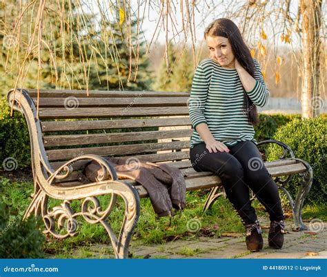 Girl Sitting On Bench Outdoors Stock Photo Image Of Pretty Fashion