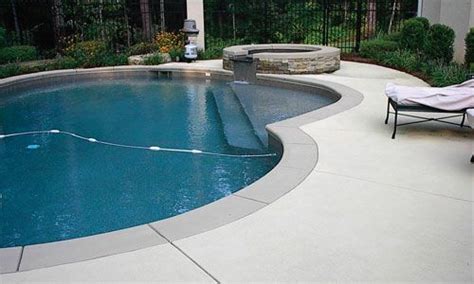 Pool With Stone Coping And Concrete Decking Concrete
