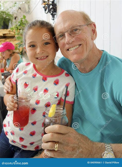 Beautiful Amerasian Girl With Her Grandpa Editorial Photo Image Of