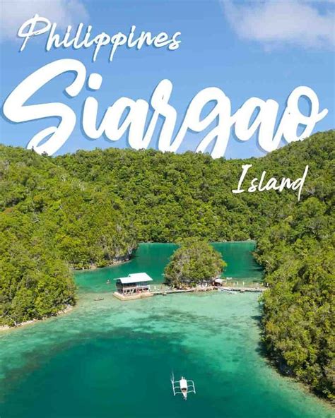 The Philippines S Siargao Island Is Surrounded By Green Trees And Blue Water