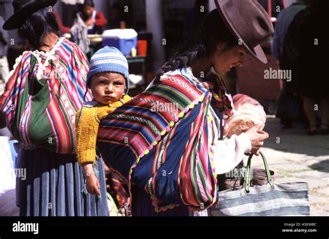 Mother Carrying Child In Bolivia South America Stock Photo Alamy