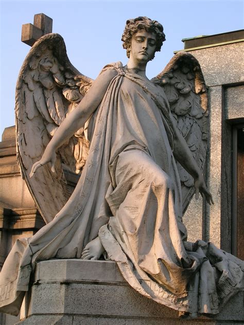 Sculpture On A Gravestone In The Monumental Cemetery In Milan Italy