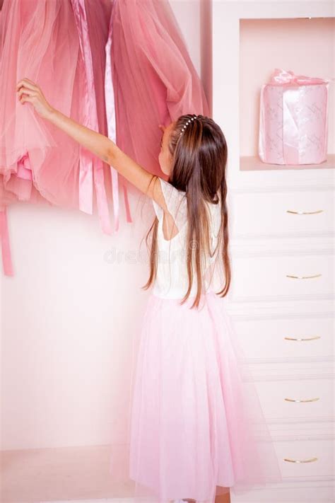 Cute Girl In The Dressing Room Chooses Her Clothes Stock Image Image