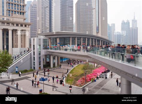 People On An Elevated Walkway Century Avenue Pudong Shanghai China