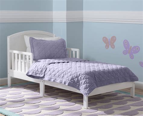 Delta Children Abby Pinewood Toddler Bed In White