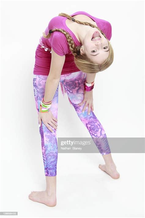 Teenage Girl Bending Over Backwards High Res Stock Photo Getty Images