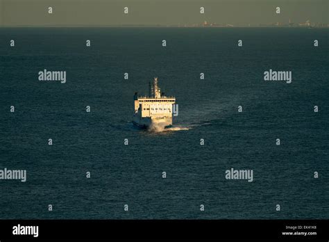Channel Ferry Crossing The Dover Straits With Calais In Distance During
