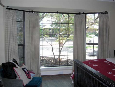 Curtain rod holder position can be adjusted, allowing curtains to be hung either close to the window or farther out. Ceiling Mount Curtain Rod Ideas - HomesFeed