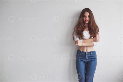 Hot Look Gorgeous Smiling Young Woman Standing With Hands Crossed